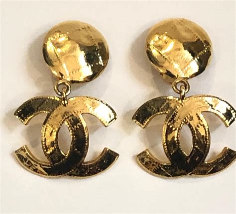 chanel logo earrings gold|chanel earrings real gold.